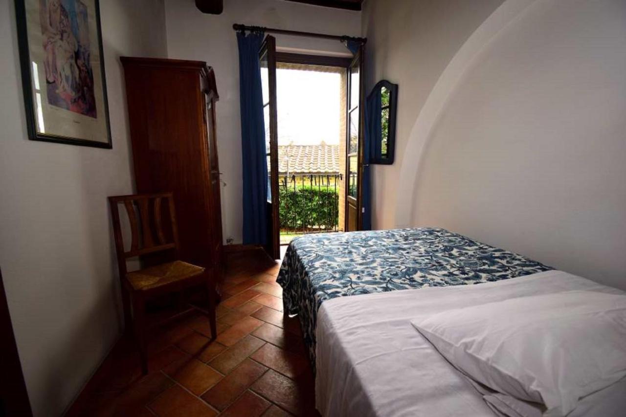 Le Rocche Di Valiano Aparthotel ภายนอก รูปภาพ