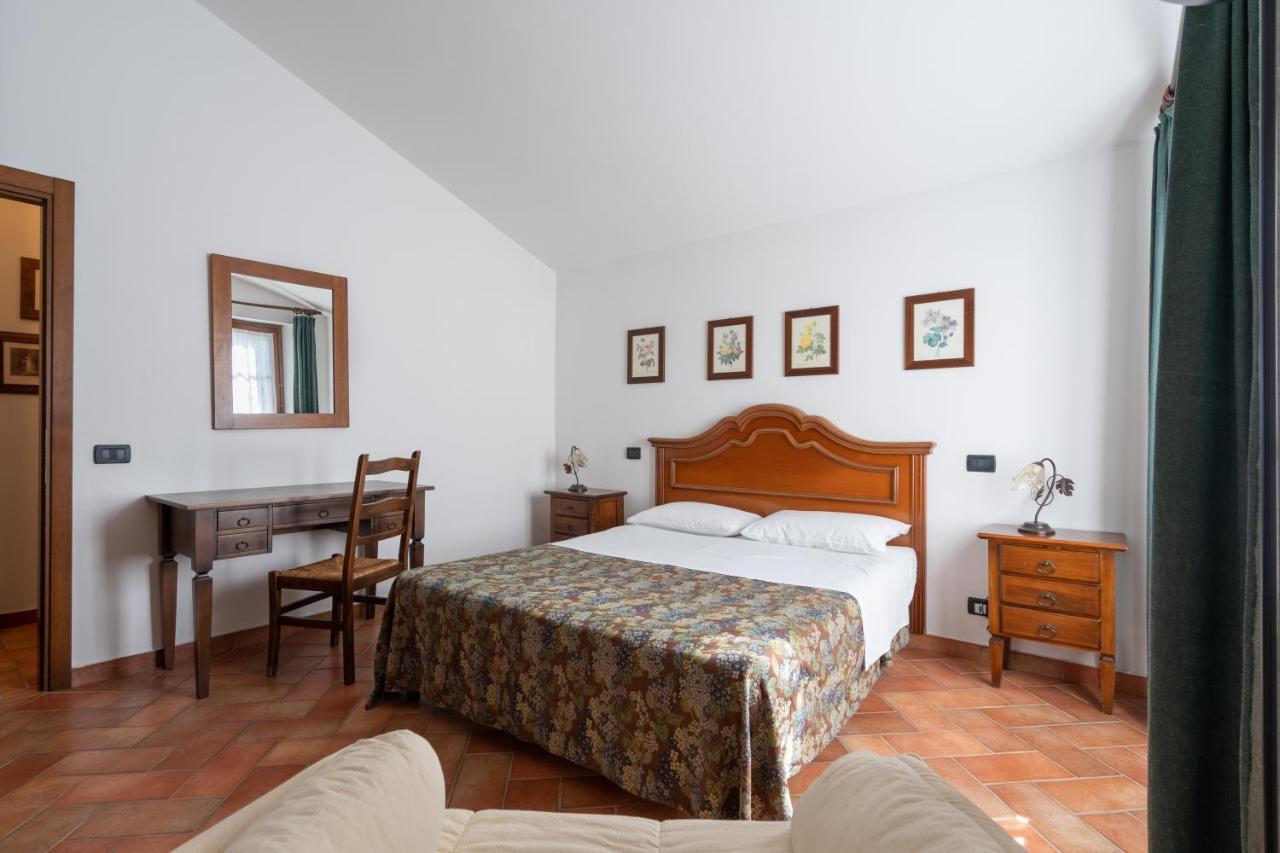 Le Rocche Di Valiano Aparthotel ภายนอก รูปภาพ
