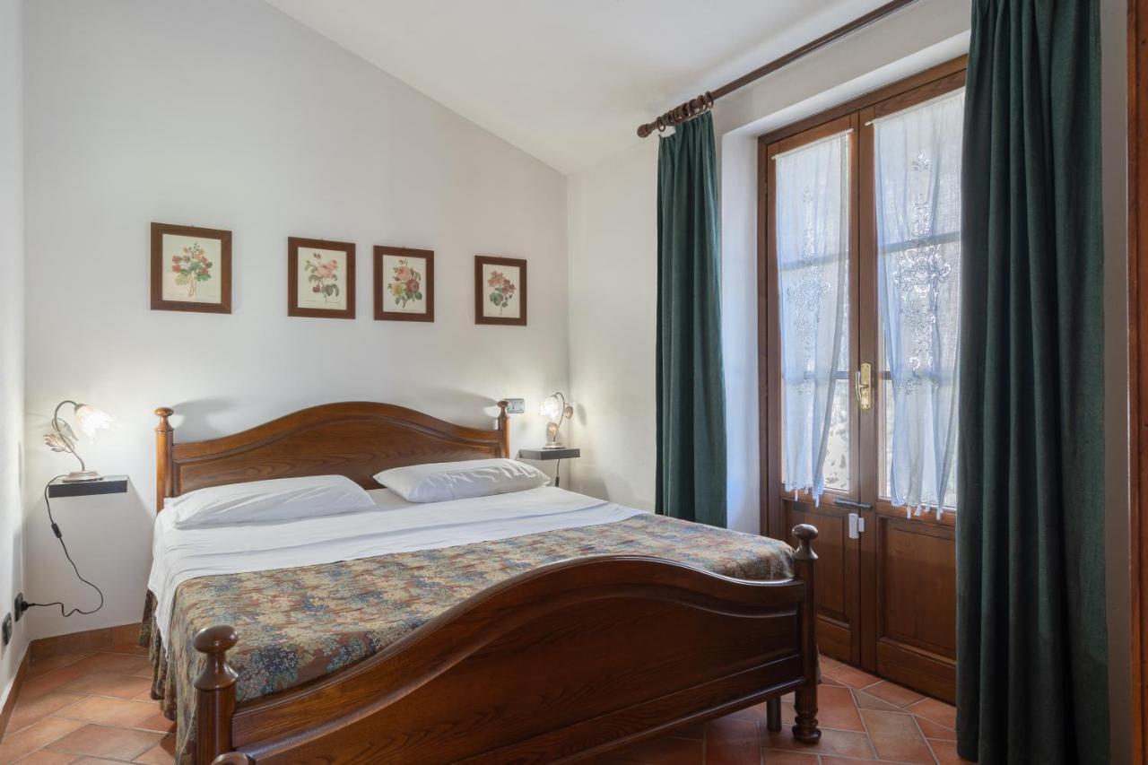 Le Rocche Di Valiano Aparthotel ภายนอก รูปภาพ